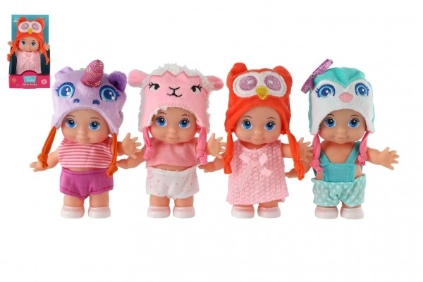 Poupée/bébé avec bonnet, plastique corps rigide 15cm, 4 types dans boîte 9x16x6cm
