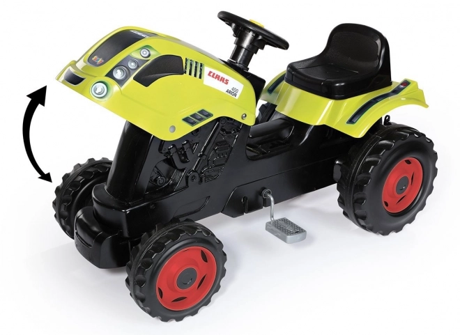 Tracteur à pédales CLAAS Arion 400 avec remorque verte