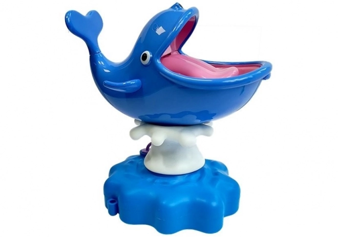 Jeu d'arcade de la baleine éclaboussant l'eau
