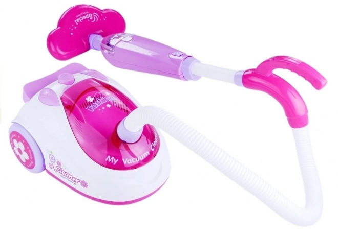 Aspirateur rose pour enfants à piles avec deux embouts