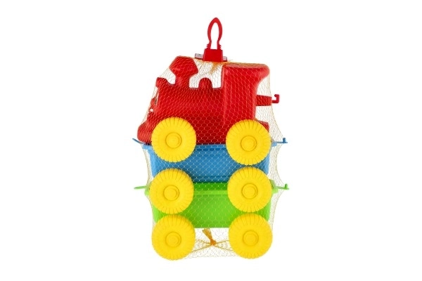 Train + 2 wagons en plastique 60 cm dans un filet