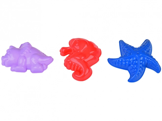 Ensemble coloré de jouets de sable avec seau et moules
