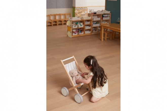 Poussette en bois pour poupées