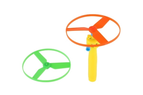 Toupie à élastique + lanceur plastique 9cm 2 couleurs en sachet