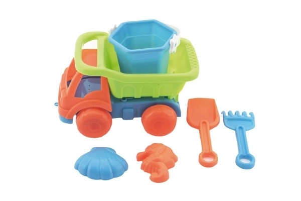 Camion de sable avec accessoires en plastique 16cm 2 couleurs dans le filet