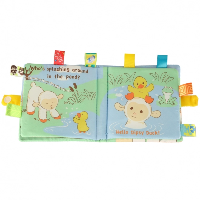 Livre sensoriel pour bébé avec un mouton et des étiquettes