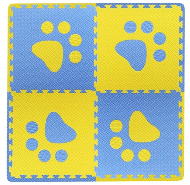 Tapis moussé pour enfants avec pattes bleues et jaunes