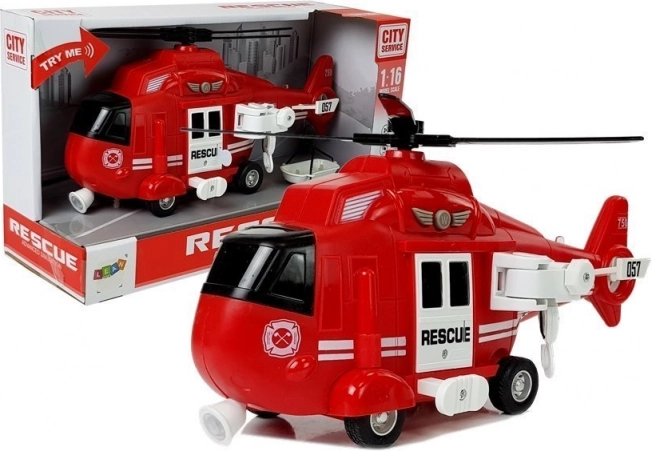 Hélicoptère de secours Sapeurs-pompiers 1:16 avec crochet, sons et lumières