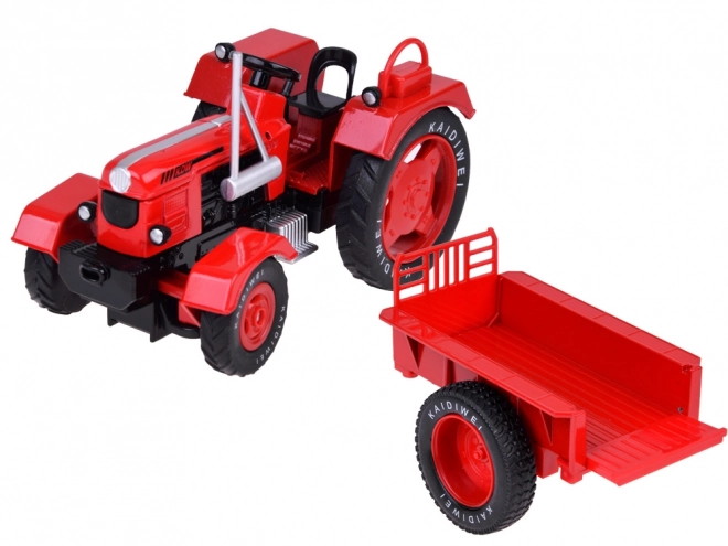 Tracteur métallique rouge avec roues en caoutchouc 1:18