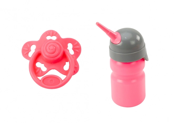 Poupée bébé avec vêtements roses et effets sonores
