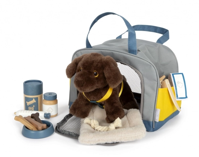 Petit chien en peluche avec set de soins