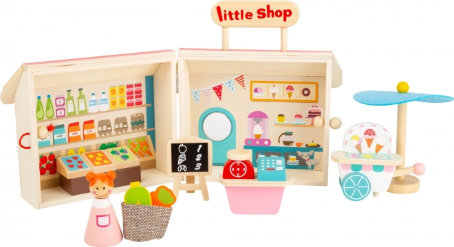 Boutique en bois dans une valise de Small Foot