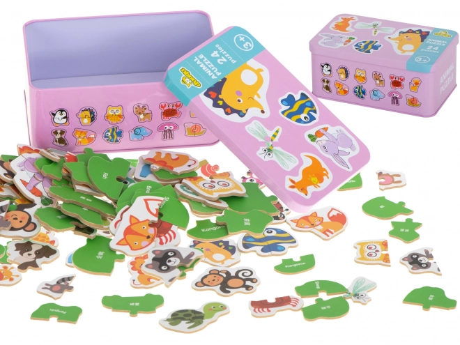 Puzzle avec motifs d'animaux dans une boîte en métal