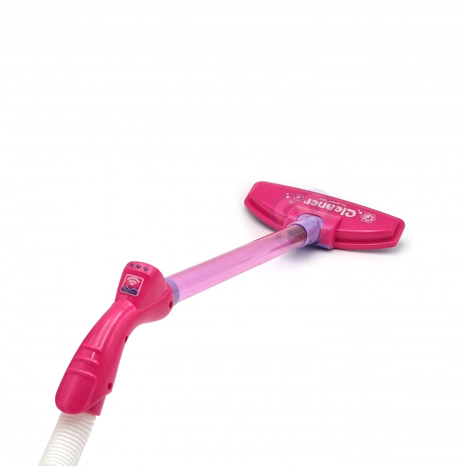 Aspirateur rose pour enfants avec fonction d'aspiration