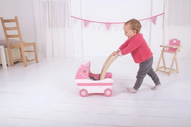 Poussette en bois rose pour poupées
