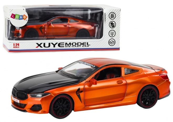 Modèle sportif en métal avec moteur à friction et éléments ouvrants 1:24 orange