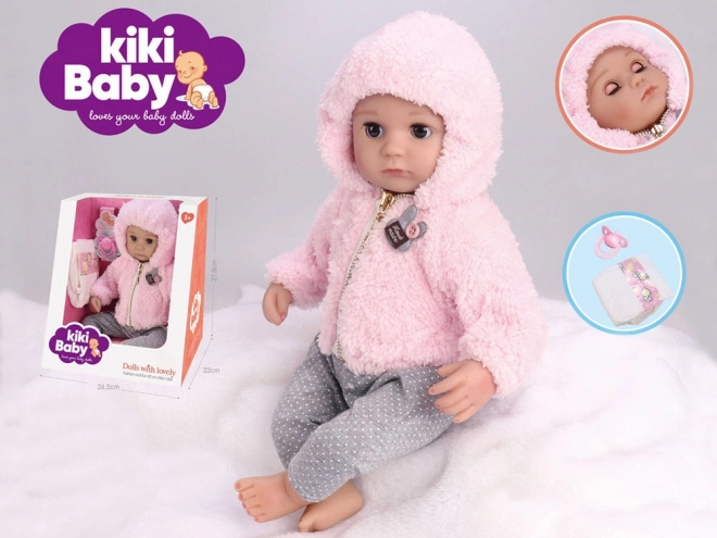 Poupée bébé en caoutchouc souple 43 cm