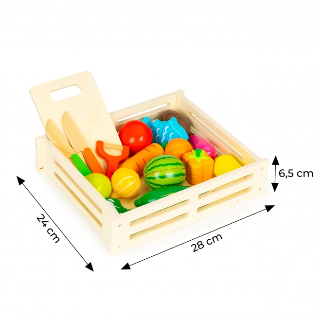 Fruits et légumes en bois à découper dans une boîte