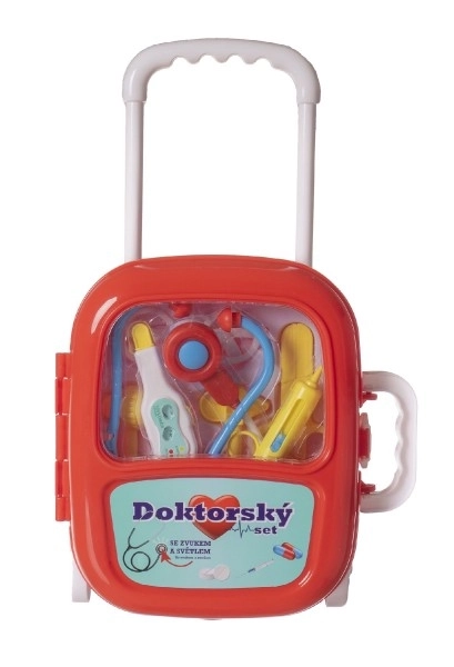 Ensemble de docteur avec stéthoscope dans une valise à roulettes