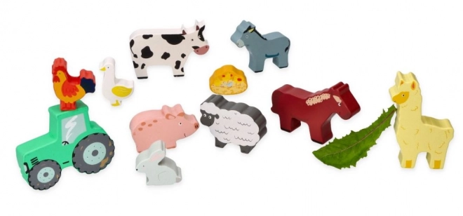Ensemble d'animaux de ferme en bois dans un cadre