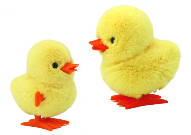 Poussin peluche jaune à remontage sautillant