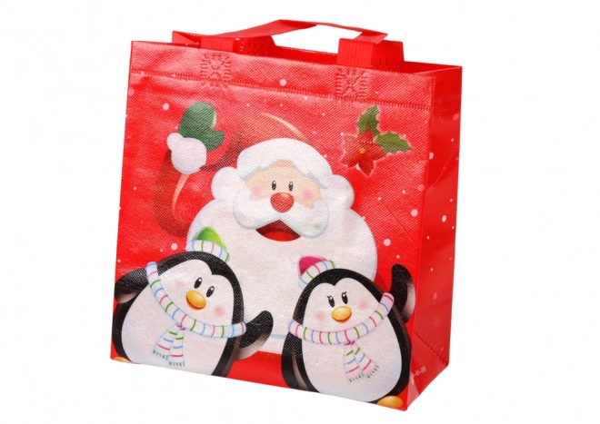 Sac cadeau Père Noël et pingouins rouge 22cm x 22cm x 11cm