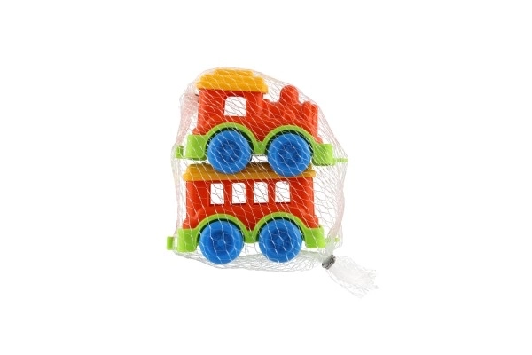Petit train en plastique avec wagon