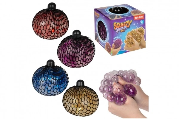 Boule anti-stress à presser en filet de boue 10cm avec paillettes 4 couleurs en boîte 9x9,5x9cm