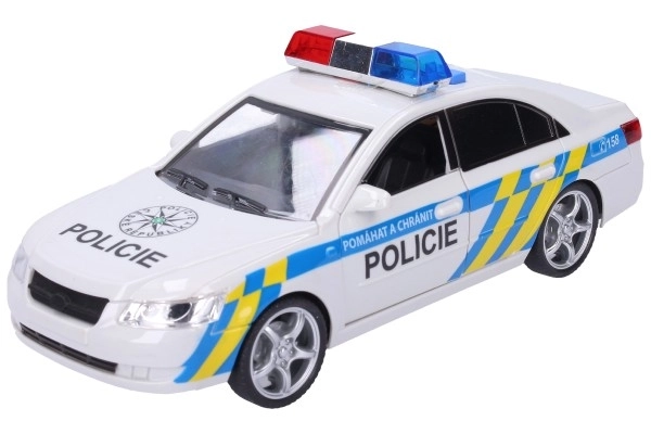Voiture de police en plastique 24cm sur batterie avec son et lumière en boîte 28x14,5x12cm