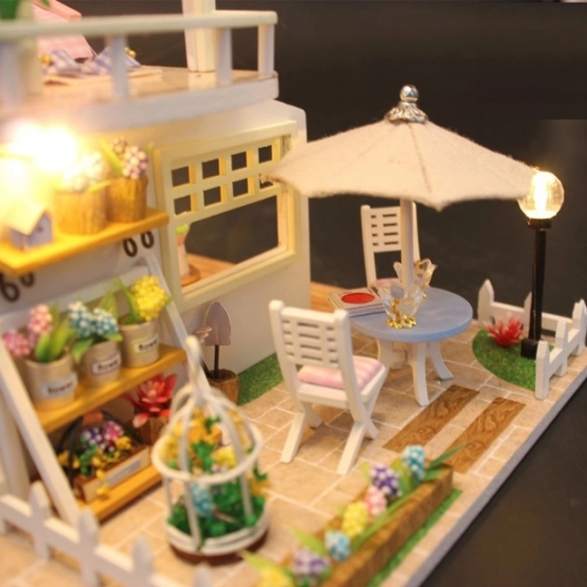 Maison de poupée en bois avec éclairage LED