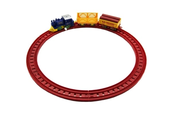 Train à clé avec deux wagons et pistes