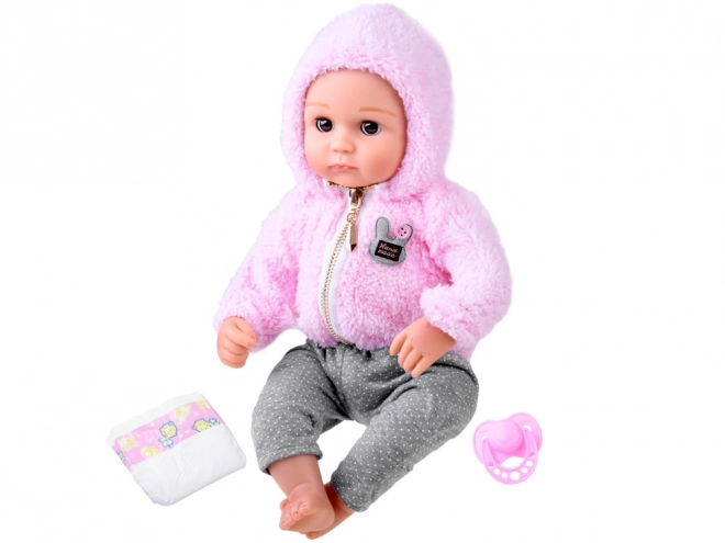 Poupée bébé en caoutchouc souple 43 cm