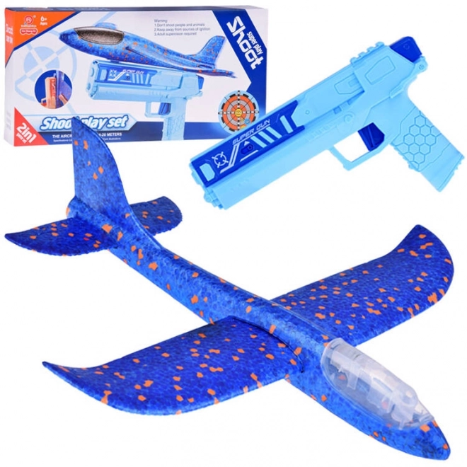 Avion en mousse avec lumière LED lancé depuis un pistolet