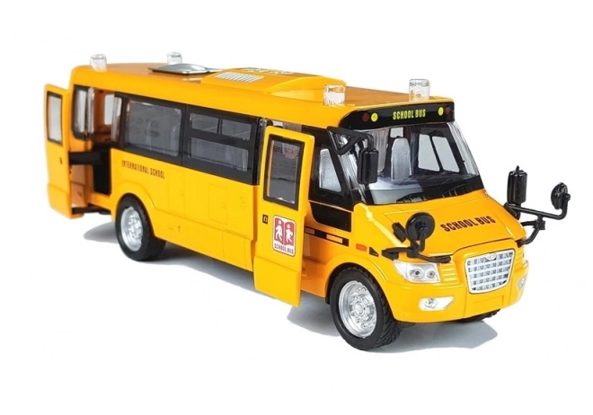 Autobus scolaire en métal avec moteur à remontoir