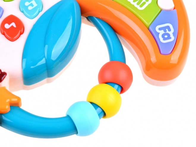 Jouet musical interactif toucan