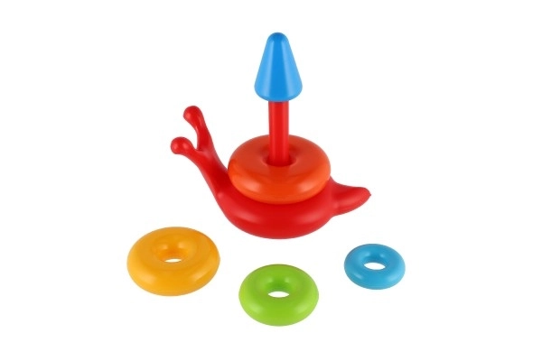 Pyramide à empiler anneaux escargot en plastique 6 pièces dans un filet 18x20x12cm 12m+