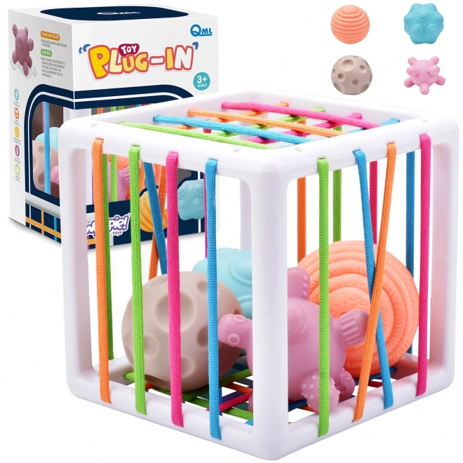 Cube sensoriel élastique pour enfants Woopie - Formes folles