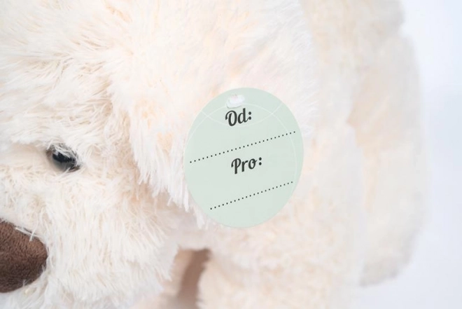 Chien en peluche crème