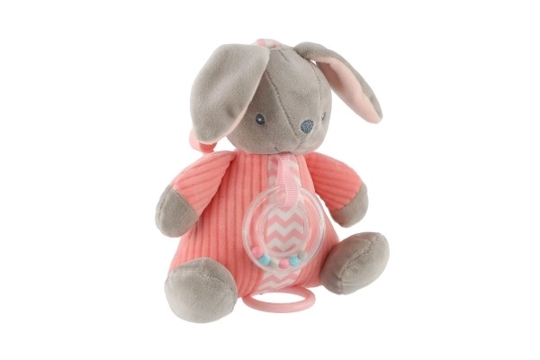 Lièvre musical à remonter avec hochet en peluche 18x20cm rose sur carte en sachet 0+