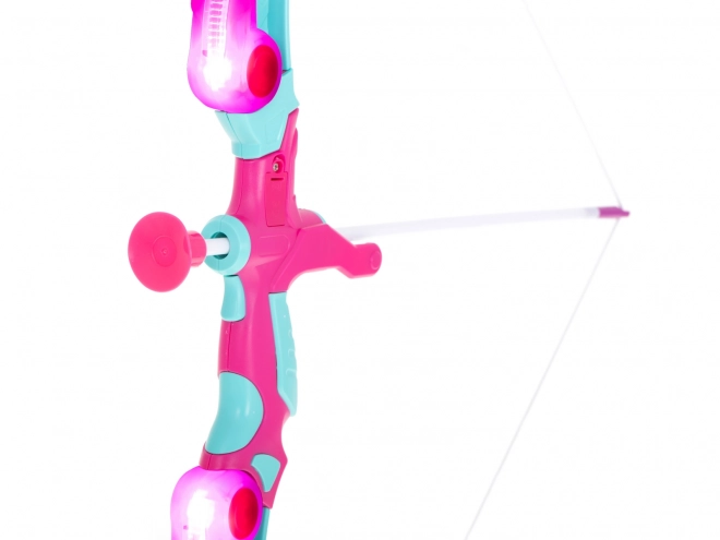 Arc rose avec flèches et cible