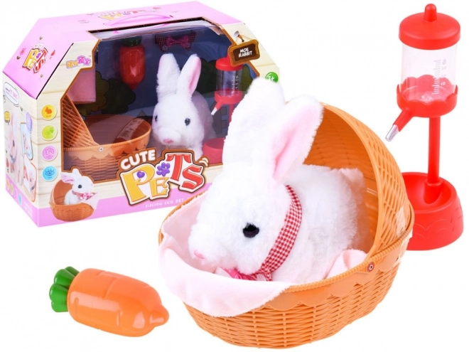 Lapin interactif dans un panier avec accessoires – Rose