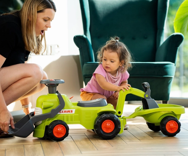 Tracteur roulant Claas avec remorque, chargeur et pelle