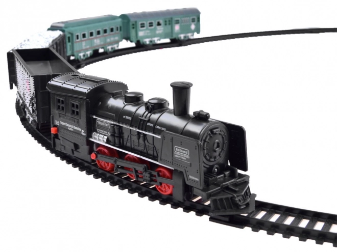 Chemin de fer électrique avec locomotive et wagons