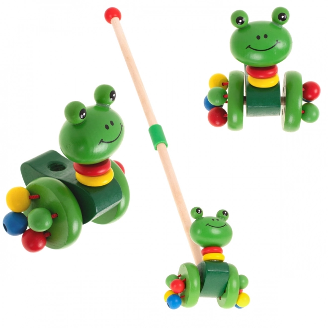 Grenouille en bois sur bâton