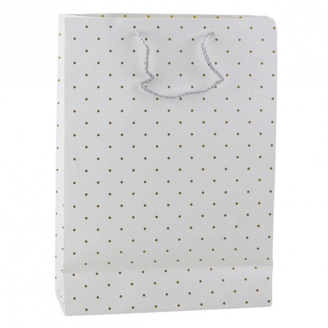 Sac cadeau avec des points dorés