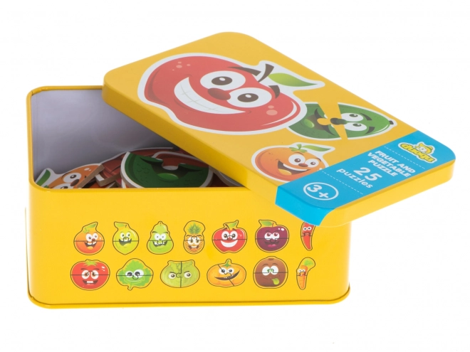 Puzzle avec des motifs de fruits et légumes dans une boîte en étain