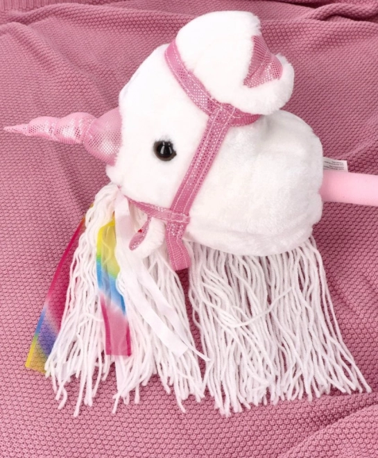 Licorne à bascule sur bâton Rosa