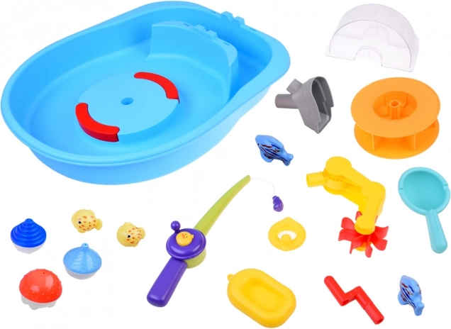 Table bleue d'eau avec roue à aubes et accessoires de pêche