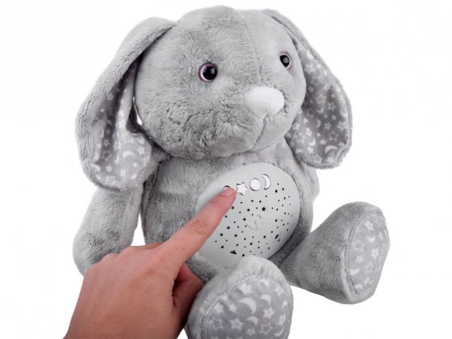 Lapin projecteur avec berceuses et bruit blanc