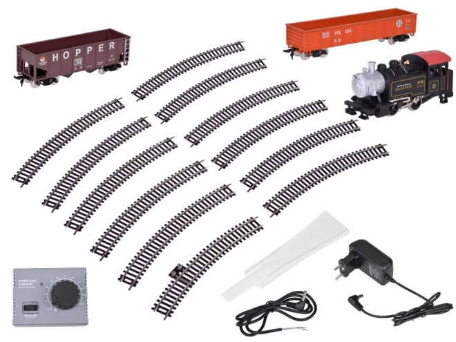 Ensemble de train électrique avec locomotive à vapeur classique et unité de contrôle